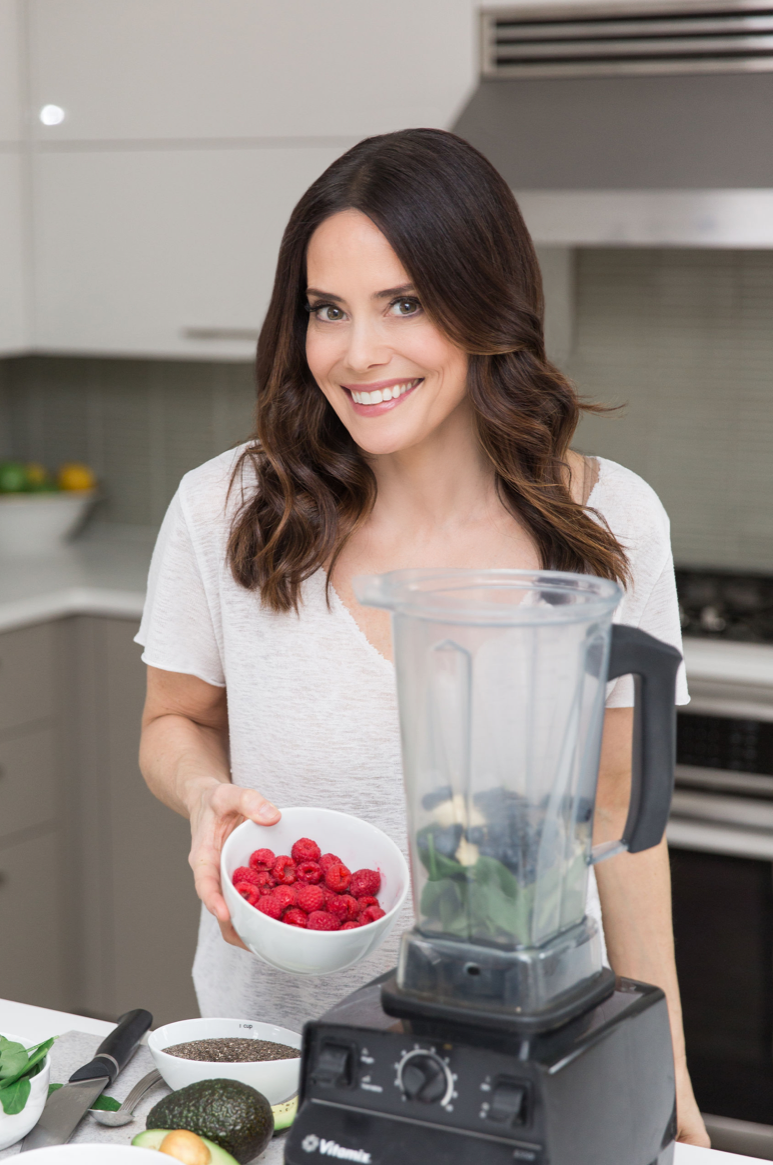 Keri Glassman with fresh raspberries